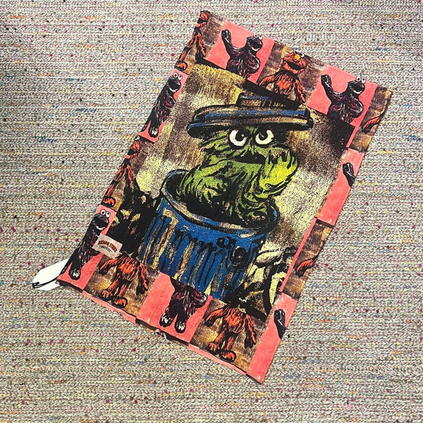 'OSCAR THE GROUCH' LINEN TEA TOWEL BY DAVID BROMLEY