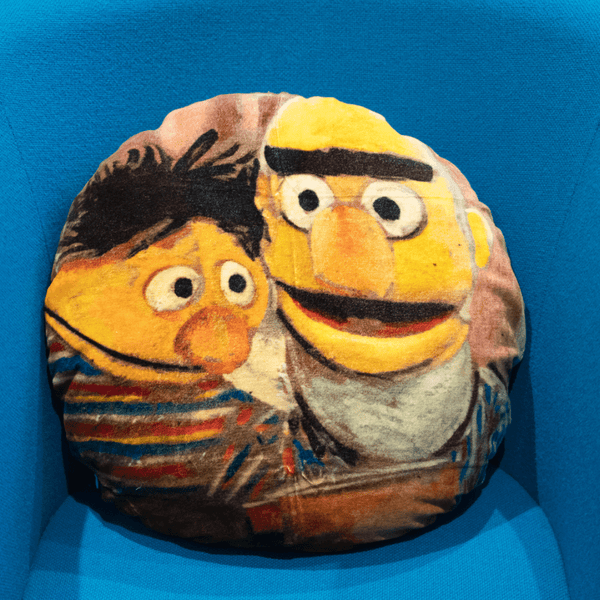 'BERT & ERNIE' VELVET ROUND CUSHION BY DAVID BROMLEY. 50CM
