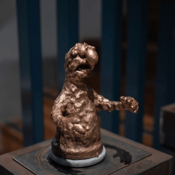 'Telly Monster’ Datsun Tran.  Paper magiclay, wire, resin and copper on a marble stand. 21 x 13 x 16 cm