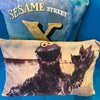 'COOKIE MONSTER' VELVET RECTANGLE CUSHION BY DAVID BROMLEY. 40 X 60CM