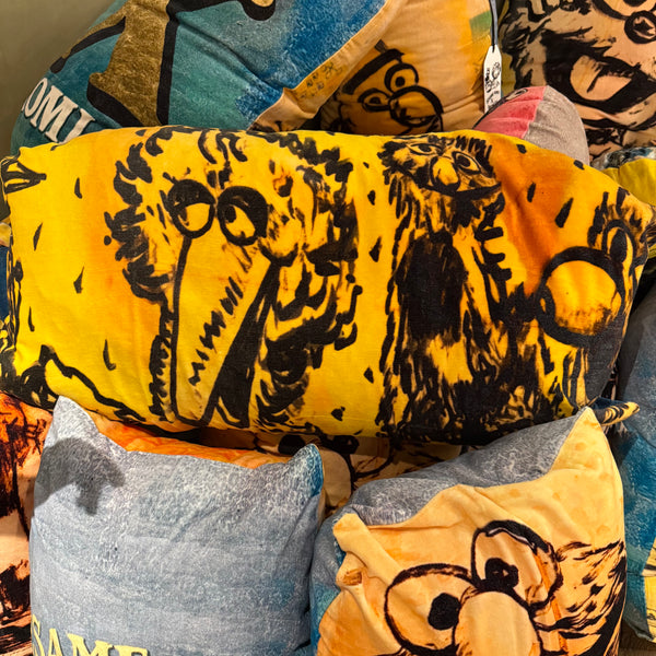 'Big Bird' Surfboard shaped cushion in cotton velvet with a feather filled inner. 78 x 35cm