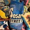 'Oscar' Surfboard shaped cushion in cotton velvet with a feather filled inner. 78 x 35cm