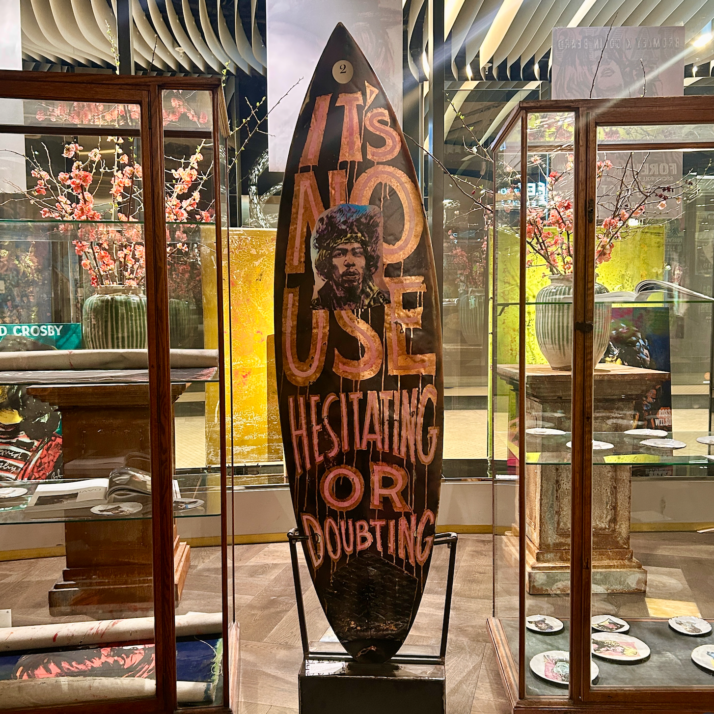 2. Customised surfboard by David Bromley. Hand painted in oils and acrylic with printed metal transfers and mixed media coatings